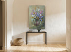 Wildflowers in Clay Pot floral canvas print on the wall of a hallway