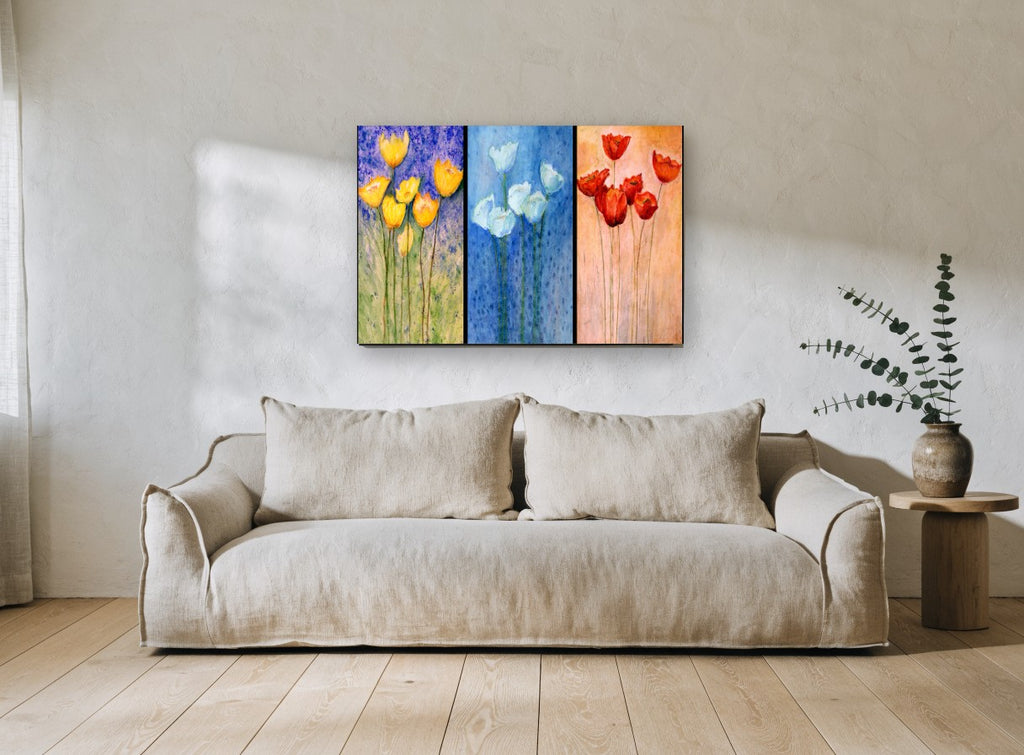 Three Panel Tulip Trio floral canvas print on the wall of a living room