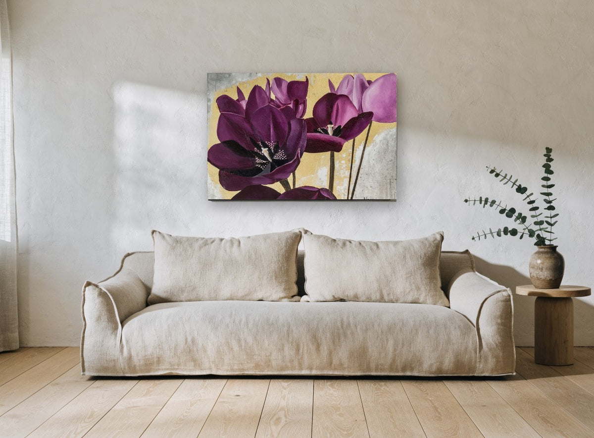 Plum Tulips on Gold floral canvas print on the wall of a living room