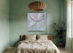 Dusky Magnolia Bloom floral canvas print on the wall of a bedroom