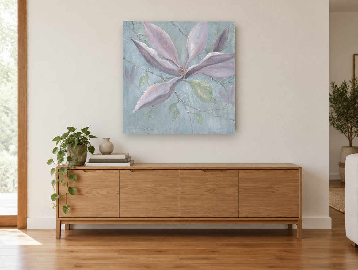 Dusky Magnolia Bloom floral canvas print on the wall of a living room above a sideboard