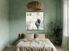 Seashells and Postmarks coastal canvas print on the wall of a bedroom