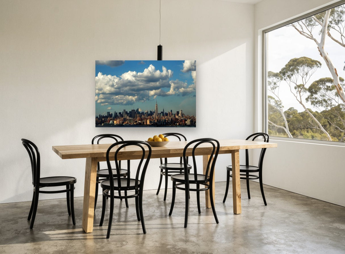 Manhattan Under Cumulus city canvas print on the wall of a dining room