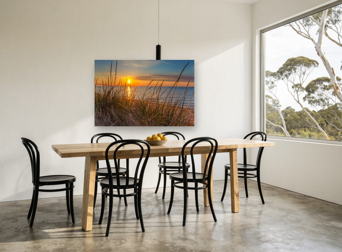 Dune Grass Sunrise coastal canvas print on the wall of a dining room