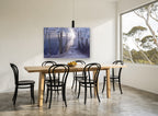 Frosted Forest Light landscape canvas print on the wall of a dining room