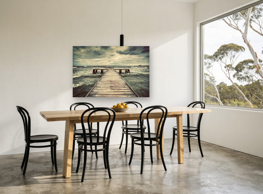 Storm Over the Jetty coastal canvas print on the wall of a dining room