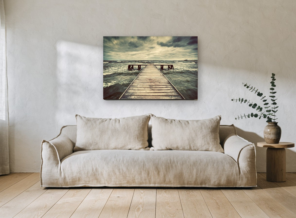 Storm Over the Jetty coastal canvas print on the wall of a living room