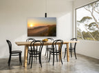 Misty Dune Sunrise coastal canvas print on the wall of a dining room