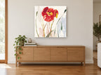 Scarlet Poppy Drift floral canvas print on the wall of a living room above a sideboard