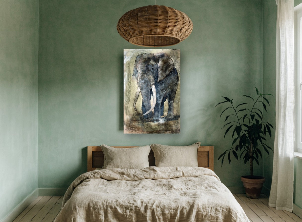 Weathered Bull Elephant animal canvas print on the wall of a bedroom