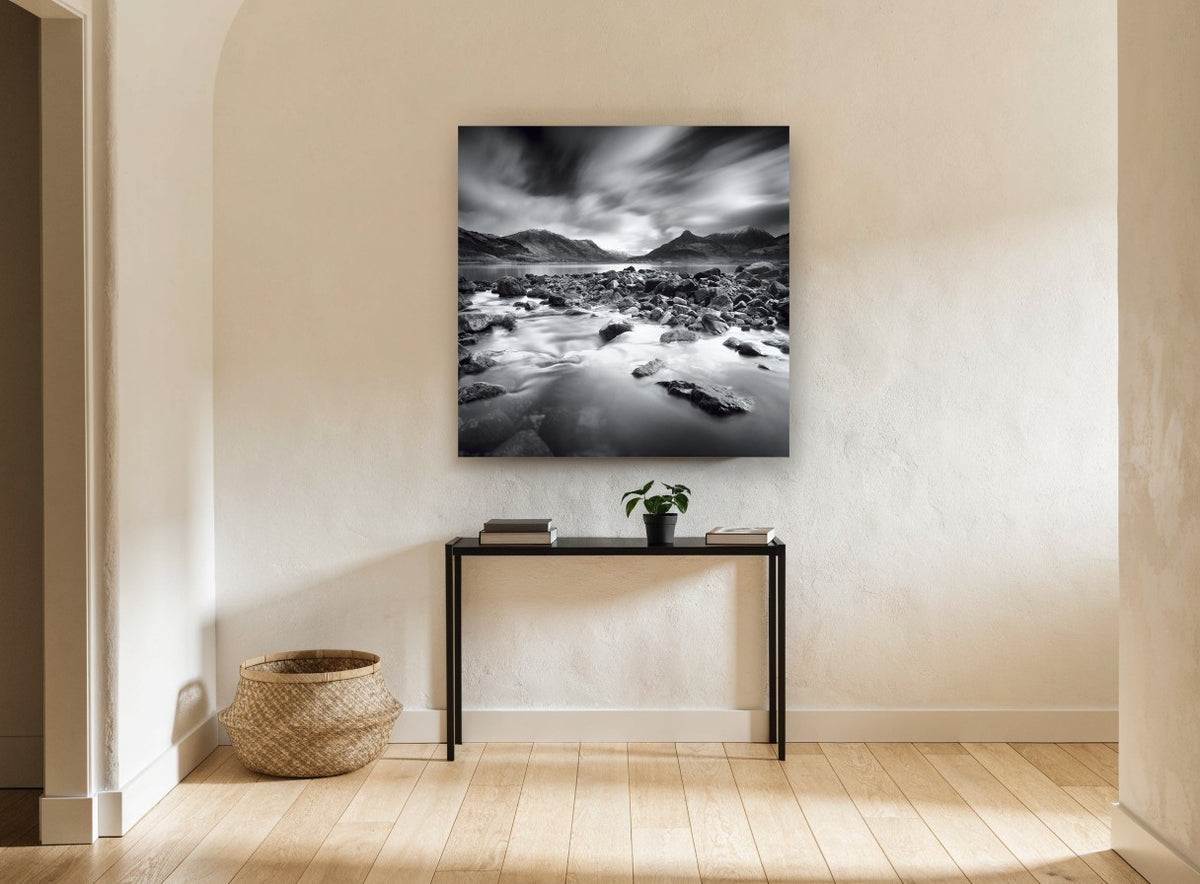 Stormlight Over Stones landscape canvas print on the wall of a hallway