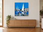 White Sails Harbour coastal canvas print on the wall of a living room above a sideboard