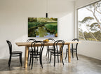 Still Creek Reeds landscape canvas print on the wall of a dining room