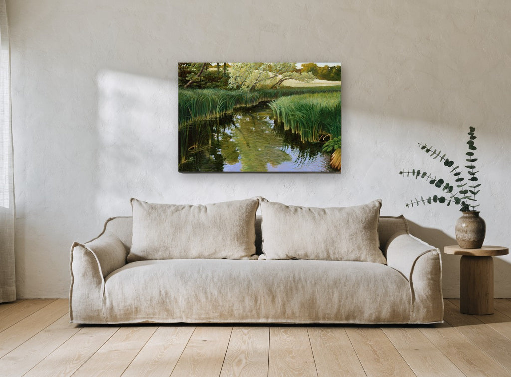 Still Creek Reeds landscape canvas print on the wall of a living room