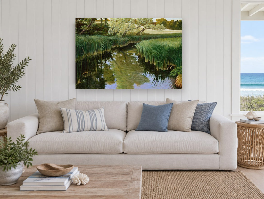 Still Creek Reeds landscape canvas print on the wall of a beach house living room