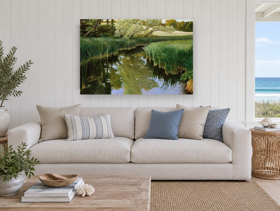 Still Creek Reeds landscape canvas print on the wall of a beach house living room