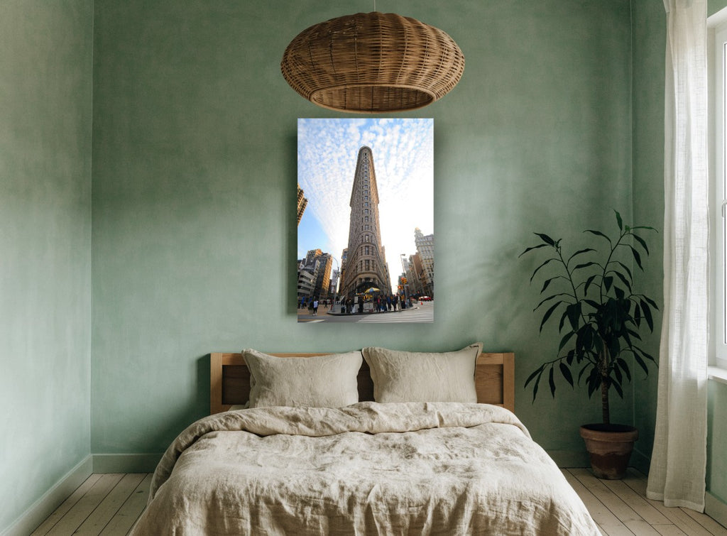 Flatiron Looking Up city canvas print on the wall of a bedroom