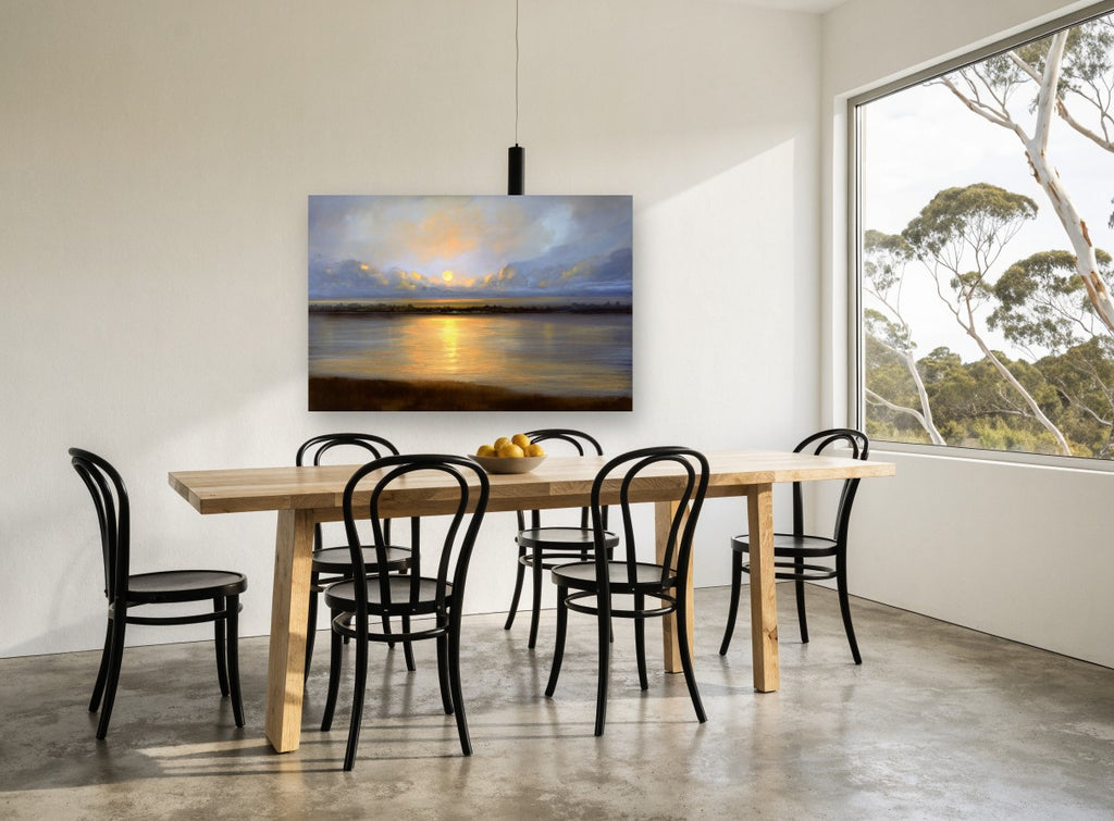 Golden Moon Over Water landscape canvas print on the wall of a dining room