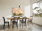 Blushed Cream Tulips floral canvas print on the wall of a dining room
