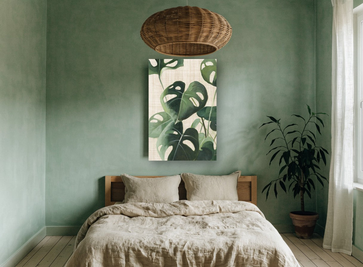 Monstera on Linen floral canvas print on the wall of a bedroom