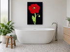 Red Poppy on Black floral canvas print on the wall of a bathroom