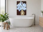 Blue Blooms on Brown floral canvas print on the wall of a bathroom