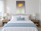 Five Golden Poppies floral canvas print on the wall of a coastal bedroom