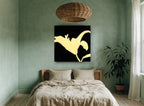 Golden Lily Silhouette floral canvas print on the wall of a bedroom