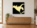 Golden Lily Silhouette floral canvas print on the wall of a living room above a sideboard