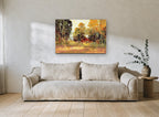 Red Barn in Autumn Light landscape canvas print on the wall of a living room