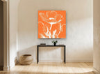 Orange Poppy Silhouette floral canvas print on the wall of a hallway