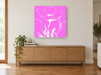 Pink Poppy Silhouette floral canvas print on the wall of a living room above a sideboard
