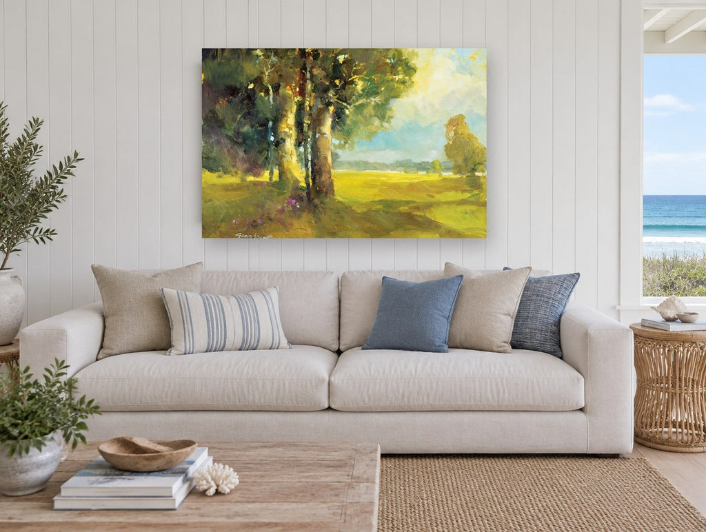 Sunlit Meadow Shade landscape canvas print on the wall of a beach house living room