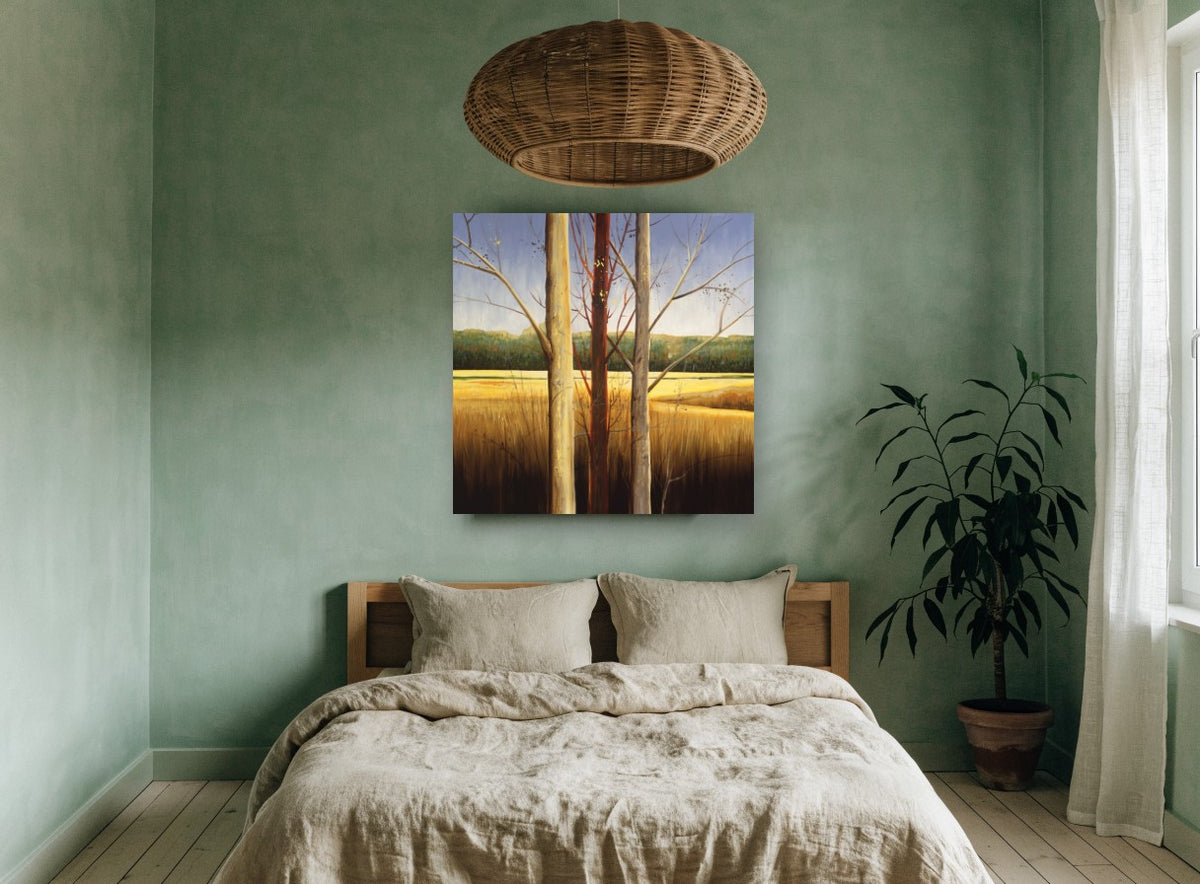 Three Trunks Golden Meadow landscape canvas print on the wall of a bedroom