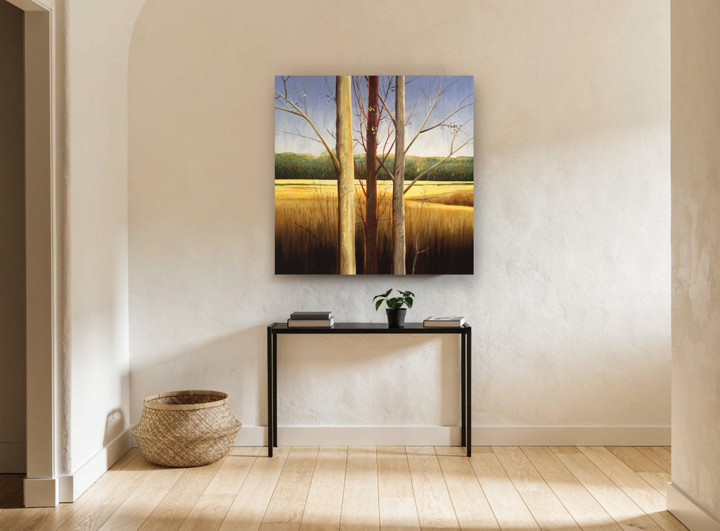 Three Trunks Golden Meadow landscape canvas print on the wall of a hallway