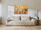 Golden Aspen Trunks landscape canvas print on the wall of a living room