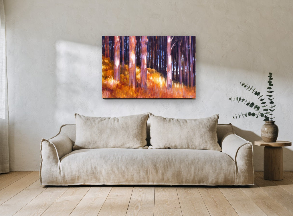Backlit Amber Trunks landscape canvas print on the wall of a living room