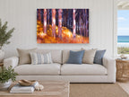 Backlit Amber Trunks landscape canvas print on the wall of a beach house living room