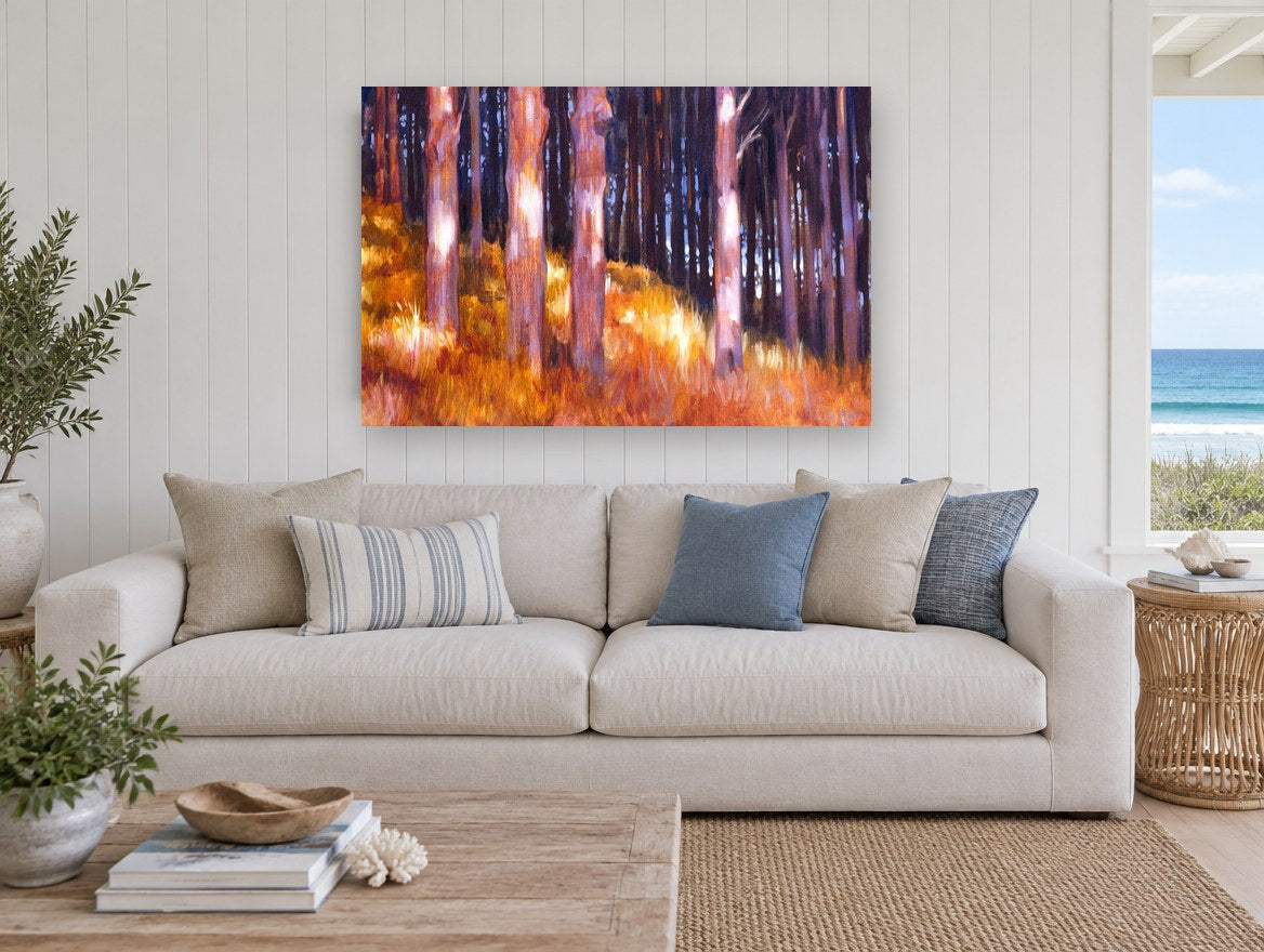 Backlit Amber Trunks landscape canvas print on the wall of a beach house living room
