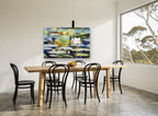 Water Lilies at Dusk floral canvas print on the wall of a dining room