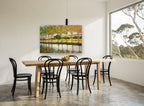Poplars Beside Still Water landscape canvas print on the wall of a dining room