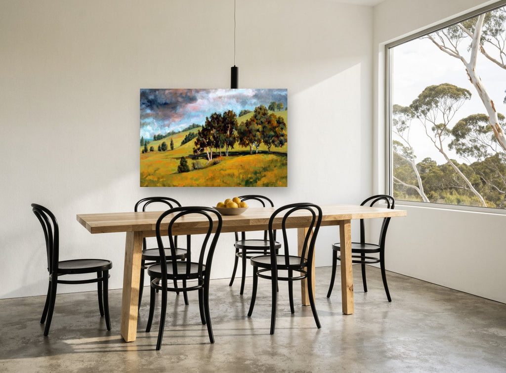 Storm Over Golden Hills landscape canvas print on the wall of a dining room