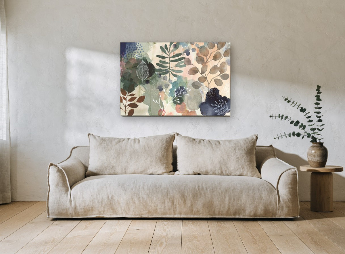 Layered Leaf Wash floral canvas print on the wall of a living room