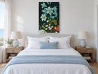 Lilies in the Dark floral canvas print on the wall of a coastal bedroom