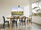 Meadow Light landscape canvas print on the wall of a dining room