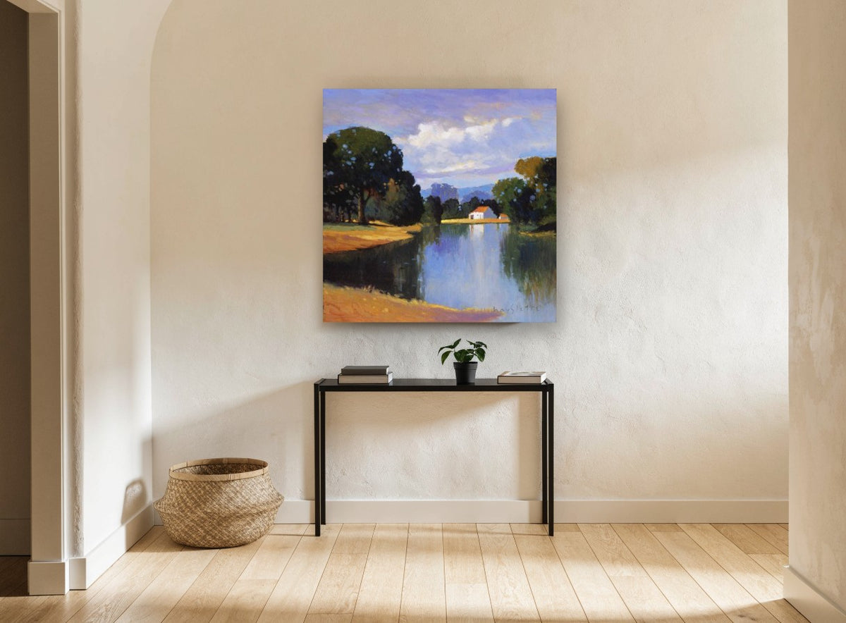 Farmhouse Across the Lake landscape canvas print on the wall of a hallway
