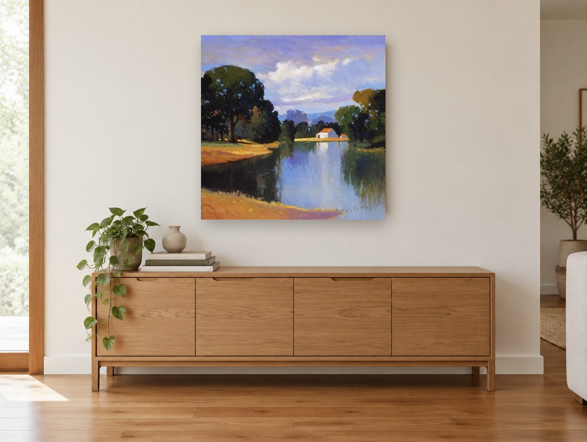 Farmhouse Across the Lake landscape canvas print on the wall of a living room above a sideboard