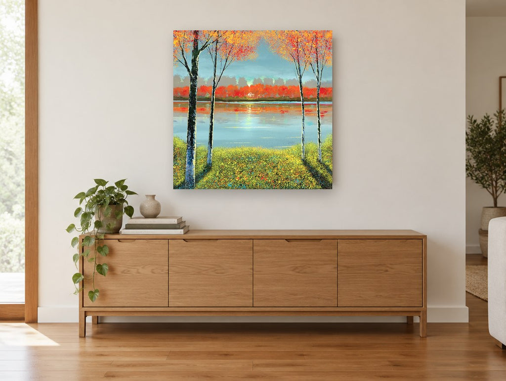 Autumn Lakeside Glow landscape canvas print on the wall of a living room above a sideboard