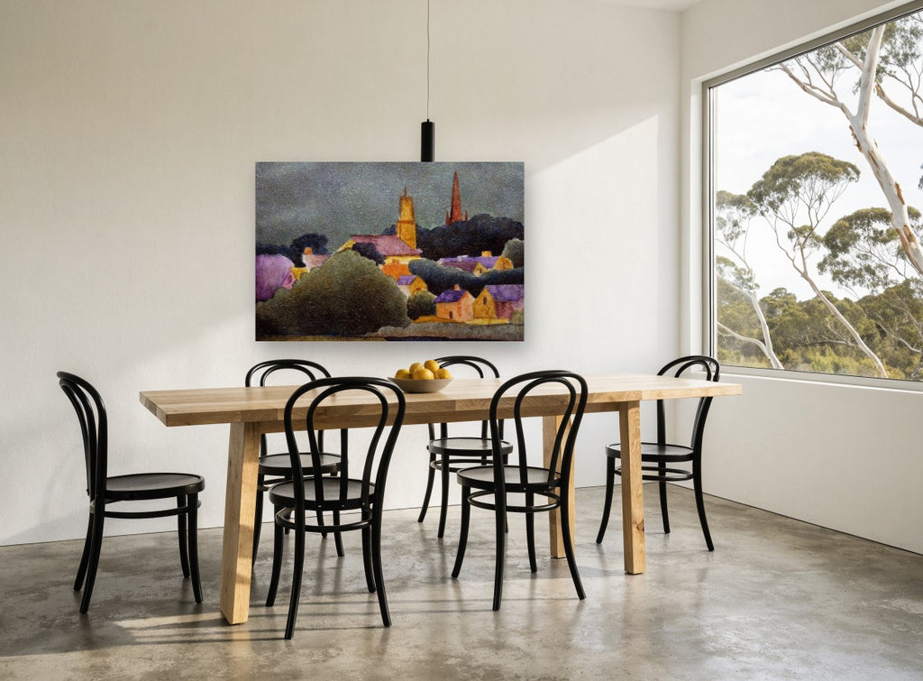 Village Beneath Storm Sky landscape canvas print on the wall of a dining room