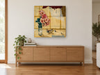Trumpet Flowers and Toy Plane floral canvas print on the wall of a living room above a sideboard